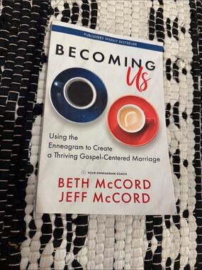 Becoming Us by Beth McCord & Jeff McCord - White Cover with Blue & Red Cups